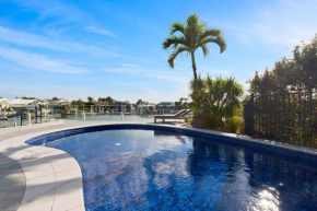 Luxurious Waterfront North Facing 5 bedroom House with pool, pontoon and Deep Water Access near Mooloolaba